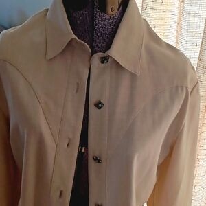 This is a Patricia Wolfe western style women's shirt.